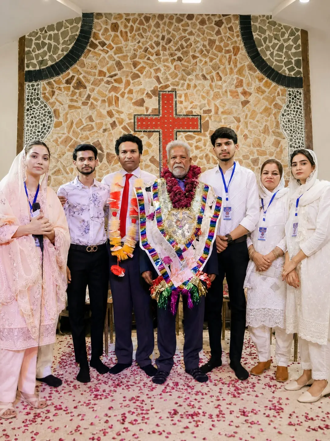 The leadership team of elders and deacons standing together at Church of Christ Pakistan