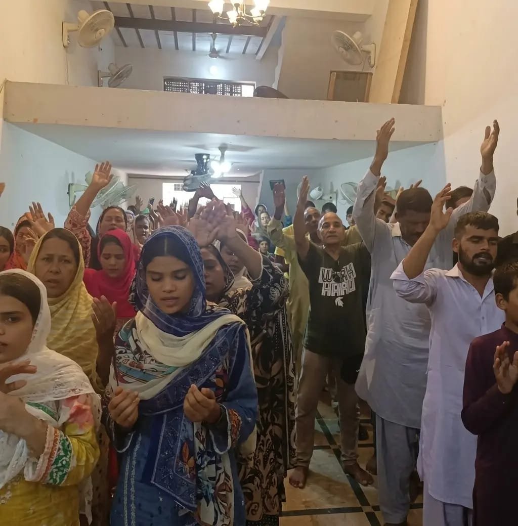 Congregation gathered together at Church of Christ Assembly in Pakistan