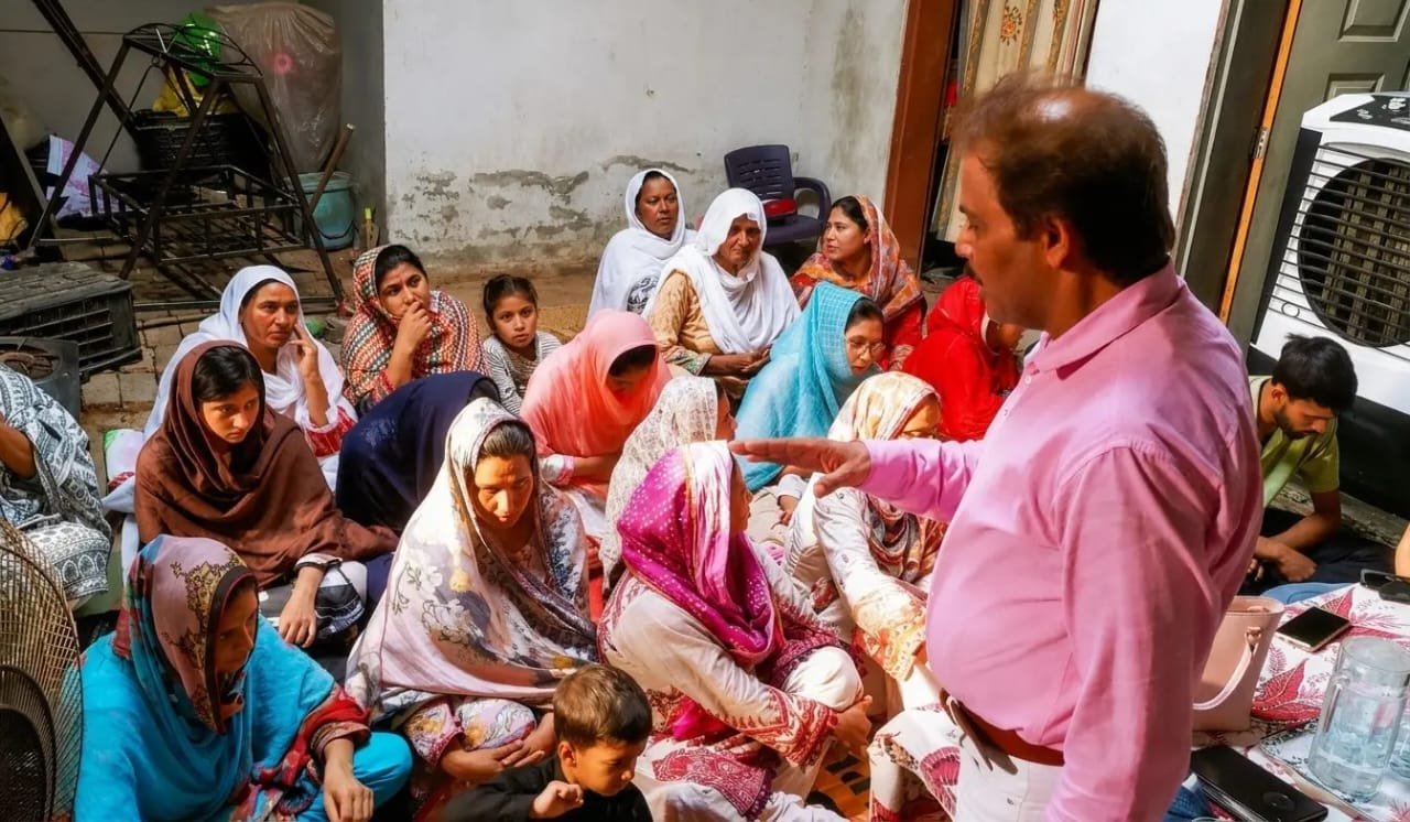 Pastor Yousaf Hussain reaching people through house-to-house outreach in Lahore Pakistan