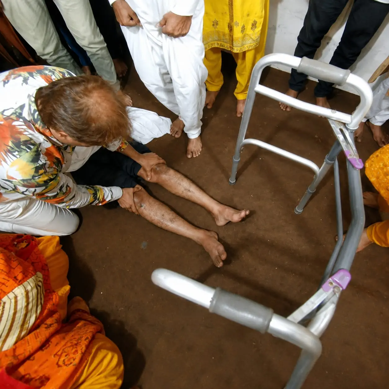 Pastor Yousaf Hussain performing divine healing prayer for the sick